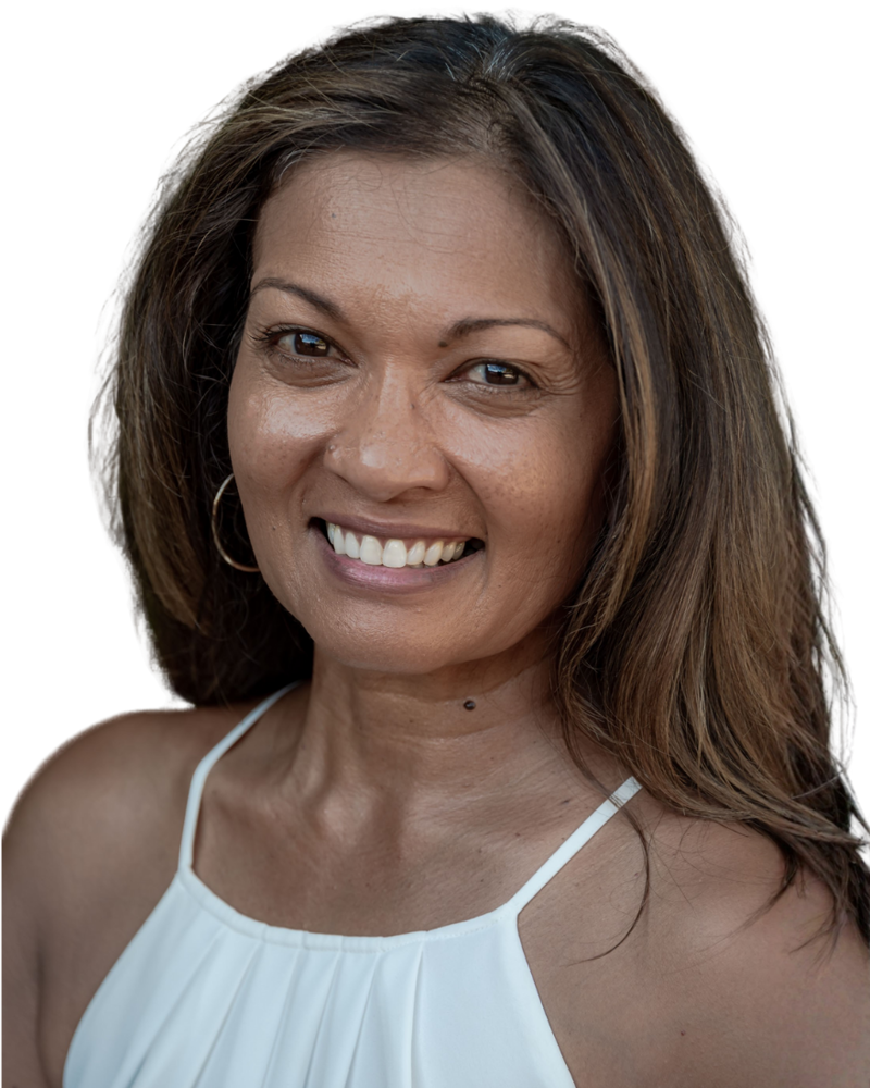 Beeneta Stables, smiling, in a white halter top.